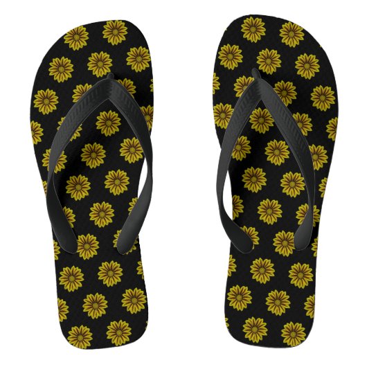 diagonaal kleine zonnebloemen tegen zwart teenslippers (Voetbed)