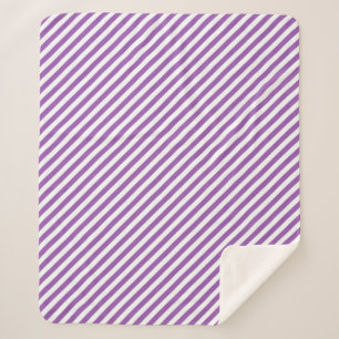 Diagonaal paars en witte strepenpatroon sherpa deken