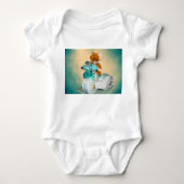 Diaper cake A diaper cake Tricycle with blue ribbo Romper (Voorkant)