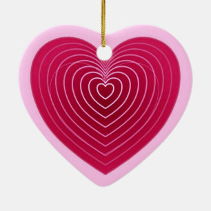 Diep roos rood hart op een bleke roze achtergrond keramisch ornament