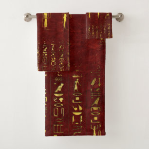 Dieux égyptiens d'or et hiéroglyphes sur le cuir