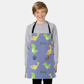 Dino-patroon op blauw schort (Gedragen)