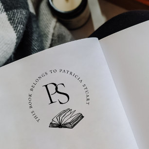 Dit boek behoort tot het monogram met gepersonalis 	rubberstempel