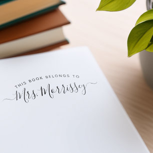 Dit boek is van handgeschreven naam zelfinktende stempel