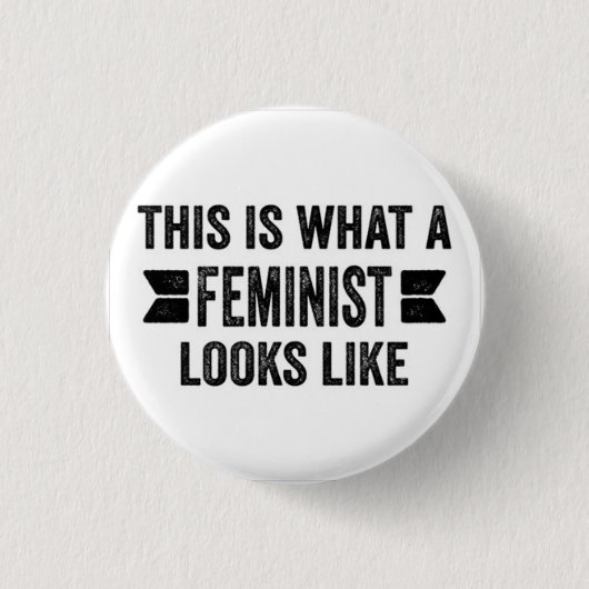 DIT IS WAT EEN FEMINIST ALS Button ZIET (Voorkant)