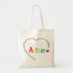 Dit kleurrijke autisme hart gemaakt met puzzelstuk tote bag