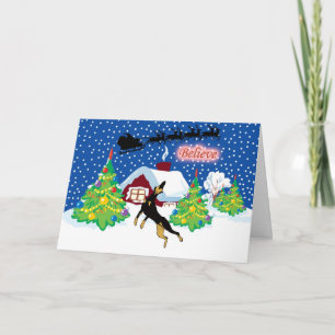 Doberman gelooft in Kerstmis van de Kerstman Feestdagen Kaart