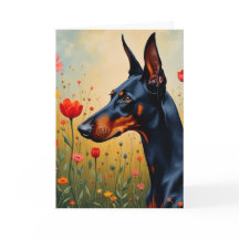 Doberman in een bloemenveld