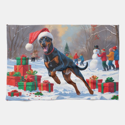 Doberman loopt in de sneeuw met kerst Pet Theedoek (Horizontaal)