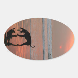 Dog sunset ovale sticker