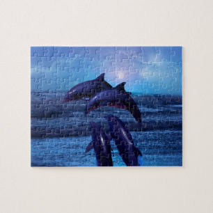 Dolfijnen die in de oceaan spelen legpuzzel