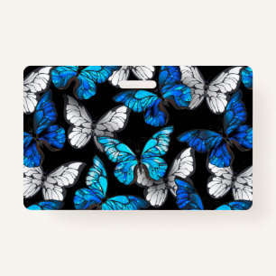 Donker naadloos patroon met blauwe vlinders Morpho Badge