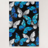 Donker naadloos patroon met blauwe vlinders Morpho Legpuzzel (Verticaal)