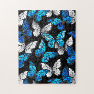 Donker naadloos patroon met blauwe vlinders Morpho Legpuzzel