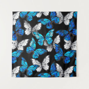 Donker naadloos patroon met blauwe vlinders Morpho Wandkleed