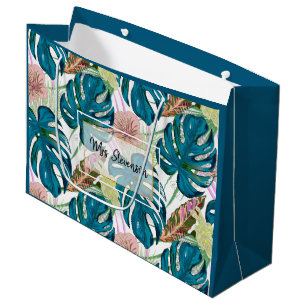 Donker turquoise monstera, delicate perzik en geel groot cadeauzakje