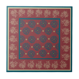 Donkerblauw en beige bloemenpatroon op diep rood tegeltje