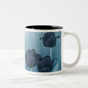 Donkere bloemen tweekleurige koffiemok