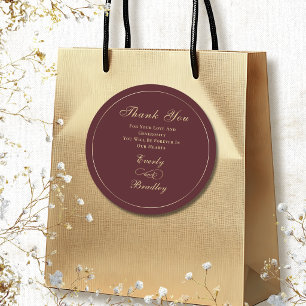 Donkere bordeauxrode achtergrond Elegante gouden s Ronde Sticker
