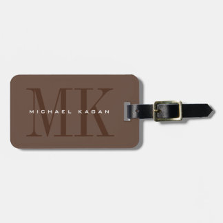 Donkere bruine minimalist met dramatische monogram bagagelabel