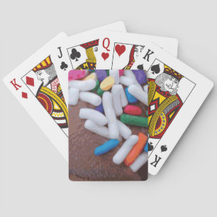 Donkere chocolade-ijs met regenboogspringen pokerkaarten
