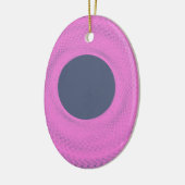 donkere cirkel in het paars keramisch ornament (Links)