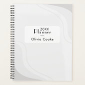 Donkere gepersonaliseerde jaarplanner met aangepas planner (Voorkant)