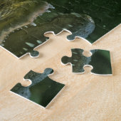 Donkere krokodil met heldere reflectie in water legpuzzel (Zijkant)