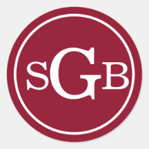 Donkerrood cirkelvormig traditioneel monogram