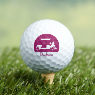 Donkerroze Golfkart met unieke voornaam in cluster Golfballen