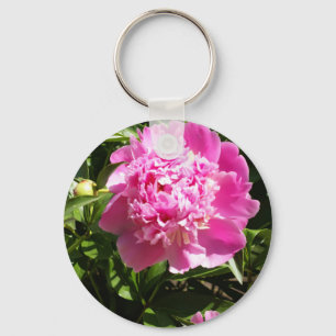 Donkerroze pinda's sleutelhanger