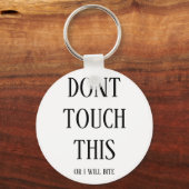 "Dont touch this or i will bite" sleutelhanger (Voorkant)