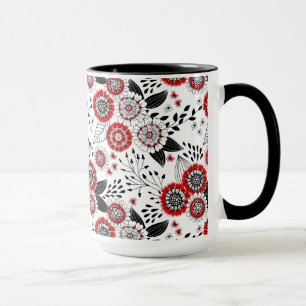 Doodle bloemen en bladeren in rood en zwart mok