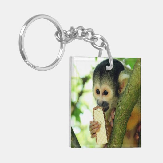 Doodshoofdaapje Eet een Wafer Biscuit Sleutelhanger (Voorkant Links)