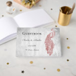 D'or Livre d'invité Mariage Pink Peacock<br><div class="desc">Enregistrez les invités à votre grande journée avec un livre d'or Pink Peacock Wedding Day. Le design du livre d'or comprend un élégant paon,  un feuillage délicat et un arrière - plan grinçant. Papier à lettres mariage supplémentaire disponible avec cette conception aussi.</div>