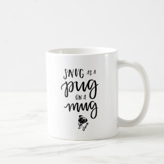 Douillettement comme carlin sur une tasse