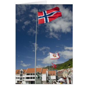 Downtown historic port area of Bergen wth flags