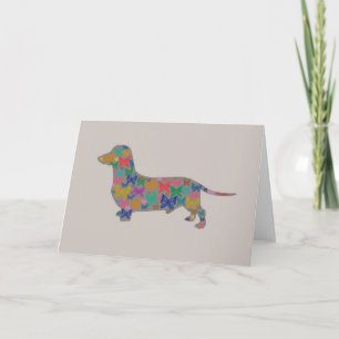 Doxie et carte de voeux de papillons