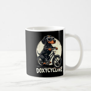 Doxycycline apotheek grappige dachshund op fiets koffiemok