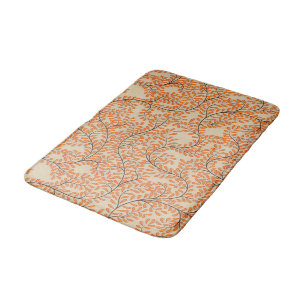 Draaiende oranje bladeren op beige achtergrond badmat