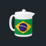 Drapeau brésilien<br><div class="desc">Ajoutez une touche de charme brésilien à votre tea time avec notre théière exclusive avec le drapeau du Brésil ! Réalisée avec une attention minutieuse aux détails, cette théière est plus qu'un simple élément de cuisine fonctionnel ; c'est une célébration du patrimoine brésilien et de la fierté nationale. Le design...</div>