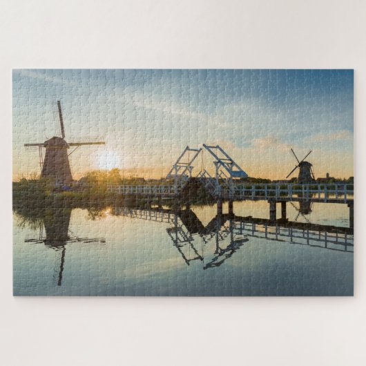 Drawbridge en windmolens bij zonsondergang in Nede Legpuzzel (Horizontaal)