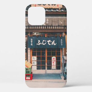 DRIE BICYCLES DIE VOOR DE BOUW WORDEN GEDEELD iPhone 12 HOESJE