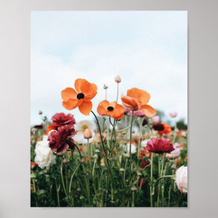 Drie bloemenposterprint van oranje bloemen poster