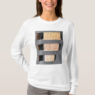 Drie cilinderzegels met indrukking t-shirt