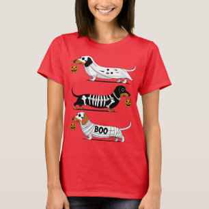 Drie feestelijke teckels in spookachtig kostuum t-shirt