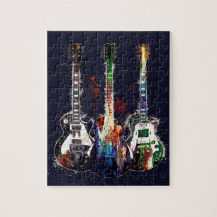 Drie gekleurde gitaren legpuzzel