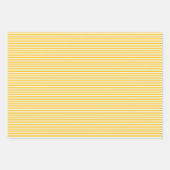 Drie gele stripes met schaduwen die papierbladen v inpakpapier vel (Voorkant)