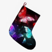 Drie gloeiende vlinders op nachtrust achtergrond grote kerstsok (Voorkant (Hangend))