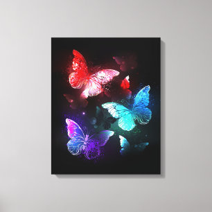 Drie gloeiende vlinders op nachtrustrondergrond canvas afdruk